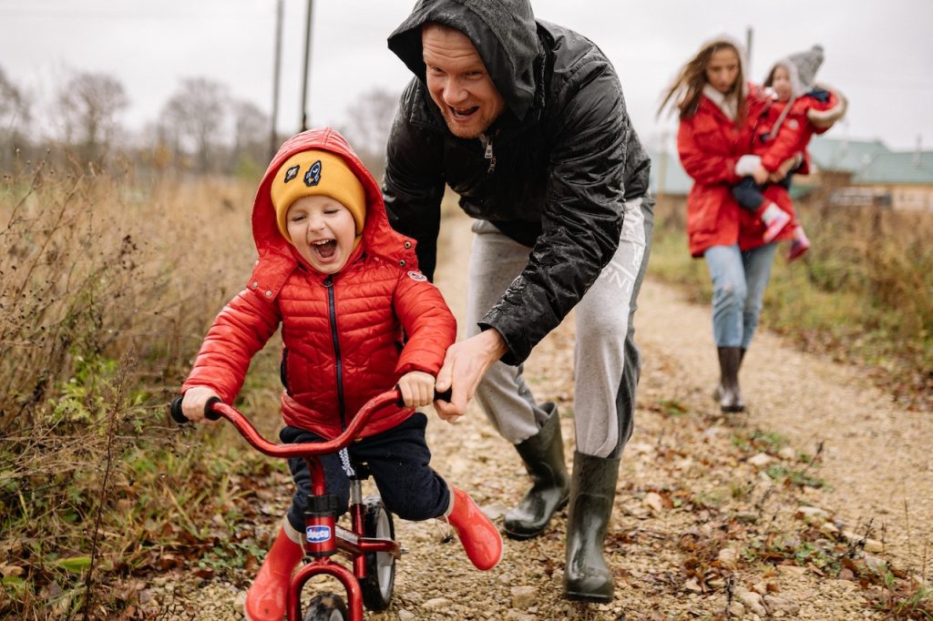 KID RUNNING A BICYCLE